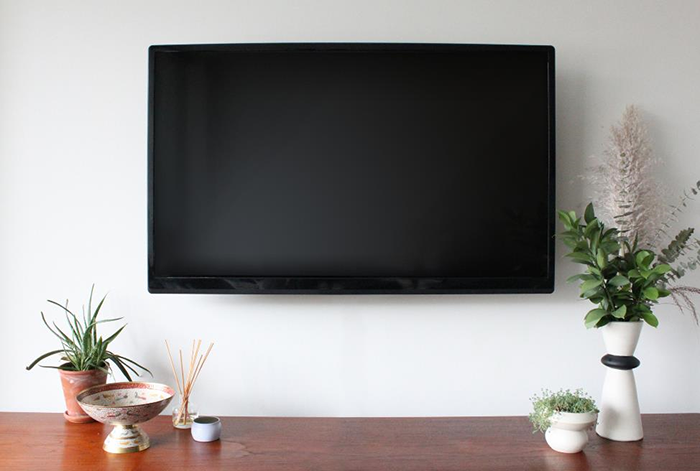 A TV mounted on a wall